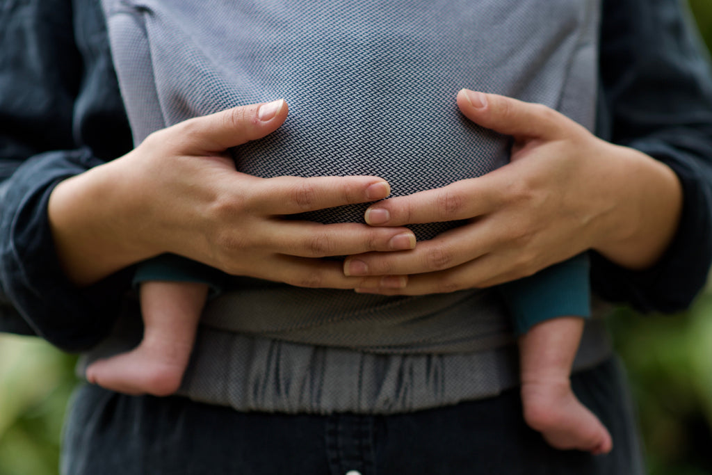 Draagdoek of draagzak huren